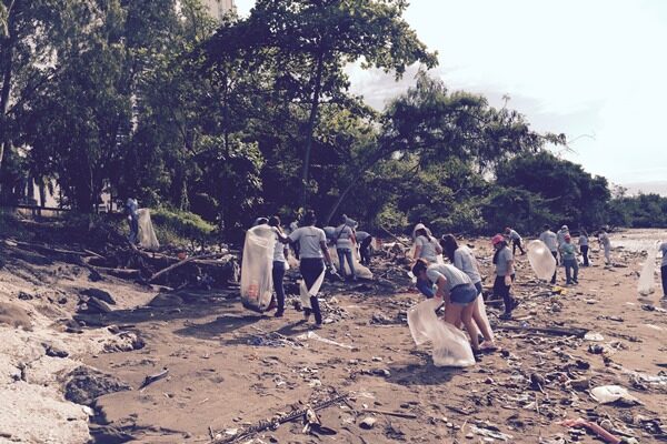 Workers collecting plastic trash